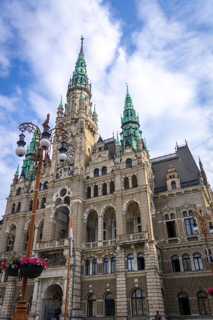 Front of the Liberec town hall with blue green patina on the top towers
