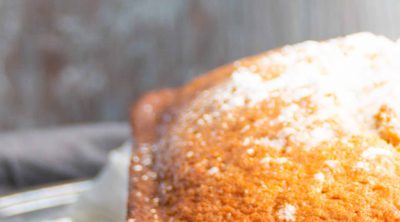 pumpkin pie spice loaf cake sprinkled with confectioners sugar