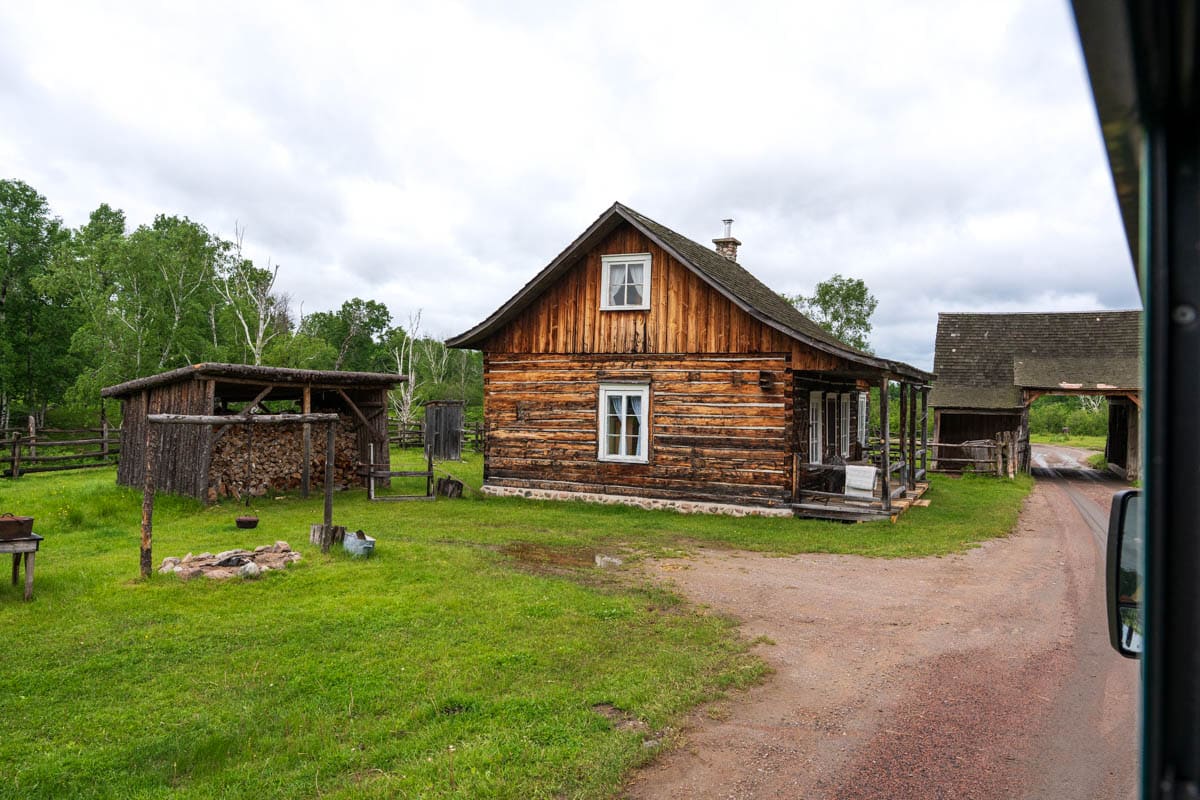 Approaching the pioneer homestead house on the wildlife train at Zoo Sauvage.